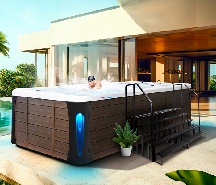 Calspas hot tub being used in a family setting - Royal Oak